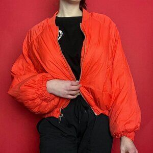 Neon orange puffer jacket​​​​​​​​​​​​​​​
